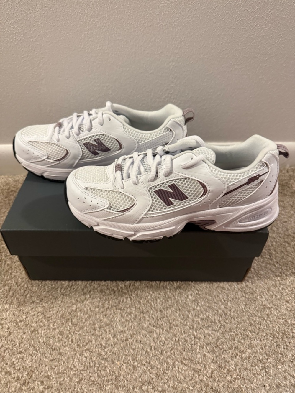 New Balance White Sneakers with Mauve Logo Accents